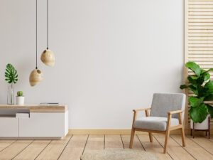 Living room interior wall mockup in warm tones,gray armchair wit
